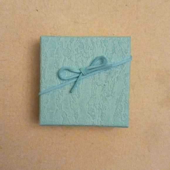 Resin earrings, 2 1/2 inches tall and 1 1/2 inches wide - Picture 2 of 3